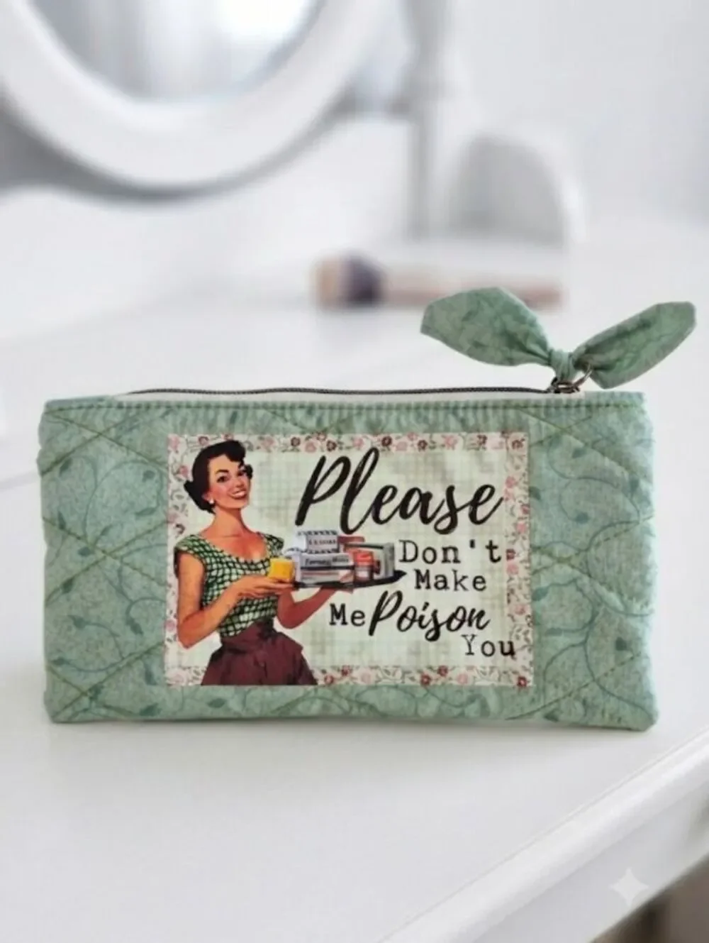 Quilted bow pouch